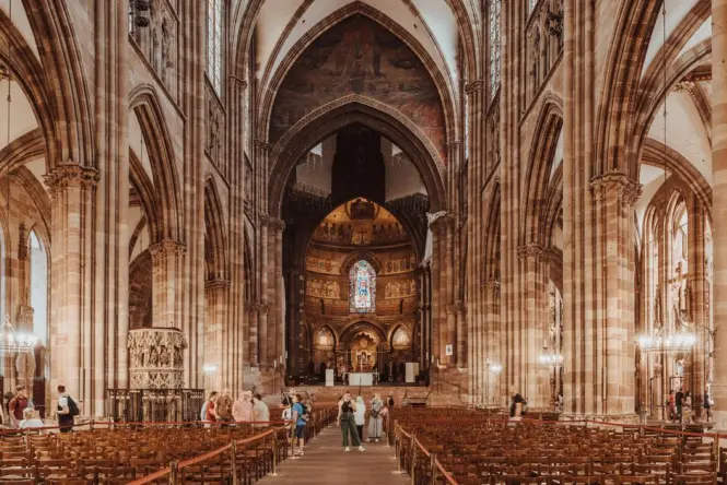 Stained glass and nave inside Strasbourg Cathedral