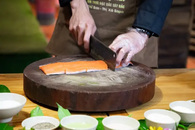 Chef leading a seafood cooking class at Sydney Fish Market Seafood School
