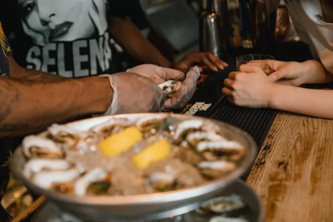 Freshly shucked oysters served on ice at Sydney Fish Market