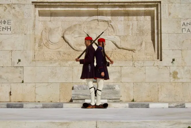Evzones soldiers performing the hourly guard change ceremony at the Tomb of the Unknown Soldier