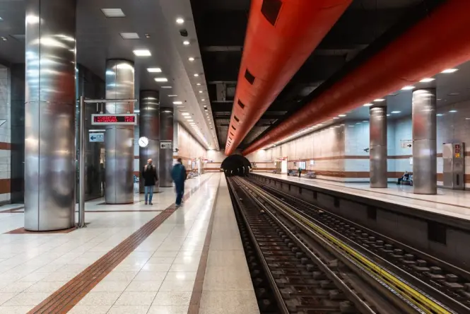 Passengers on the platform at Syntagma metro station beneath the square