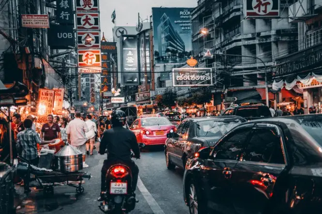 Yaowarat Chinatown street scene compared with Talad Noi