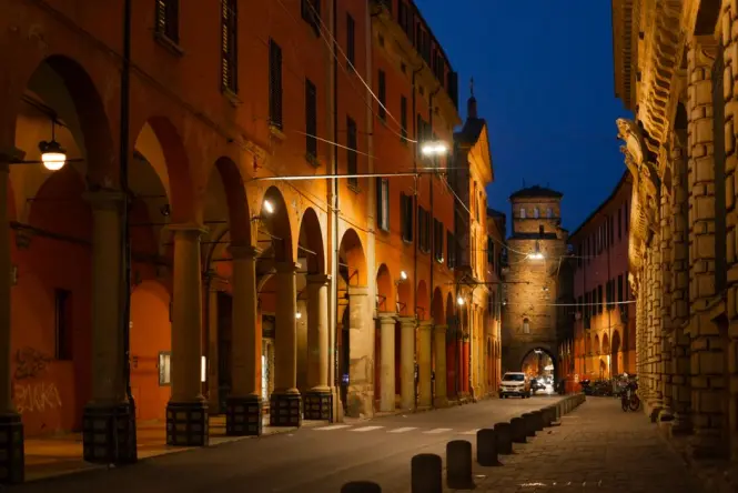 Elegant stone arches of a medieval portico in central Bologna