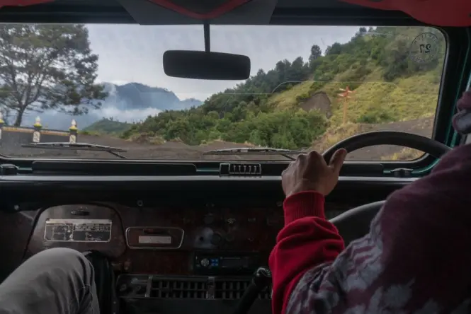 Winding mountain road through Baturiti leading toward Bedugul and Ulun Danu Beratan Temple