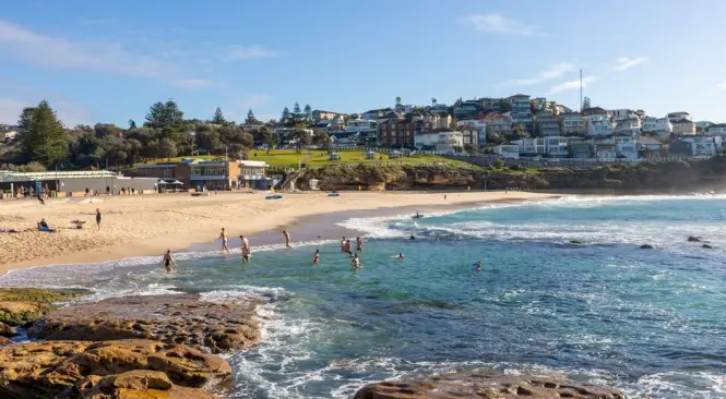 Swimmers at the calm waters of Camp Cove near Watsons Bay