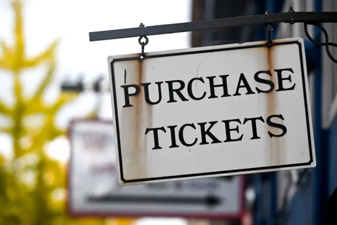 Admission pricing information near the museum entrance in Marrakech
